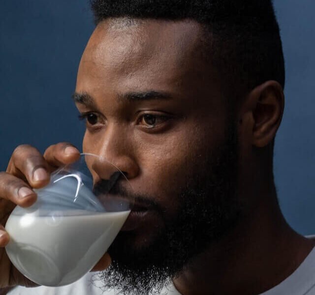 6541523ffaba2ae76653deff_man-drinking-glass-of-milk