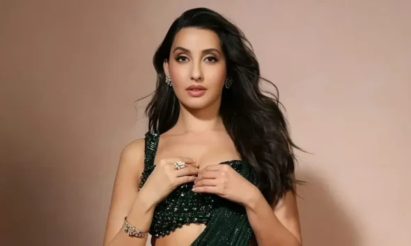 Nora Fatehi ने 'Sarke Chunar Teri Sarke' विवाद पर पहली बार बोलते हुए कहा कि Hindi Version उनकी जानकारी के बिना बनाया गया और Sanjay Dutt के साथ उनका Poster AI Generated था।